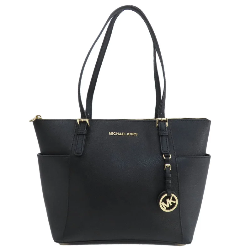 Handle bags with geometric patterns for modernity -Michael Kors  Pvc Tote Bag (Pre-Owned)