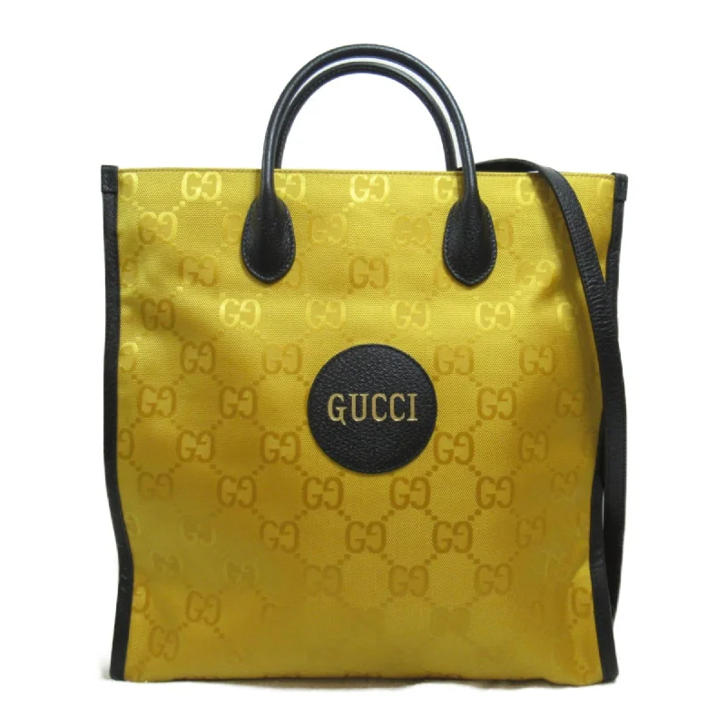 Handle bags with woven fabric for texture -Gucci  yellow Leather Nylon Tote Bag