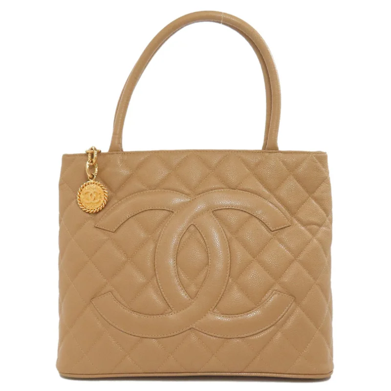 Handle bags with playful patterns for fun -Chanel  Caviar Leather Tote Bag (Pre-Owned)