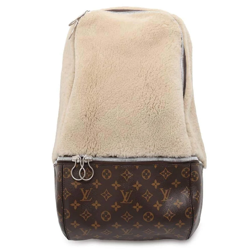 Handle bags with animal prints for flair -Louis Vuitton  ivory Monogram Leather Backpack (Pre-Owned)