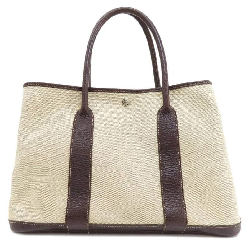 Handle bags with sleek hardware for sophistication -Hermes  Toile H Tote Bag (Pre-Owned)