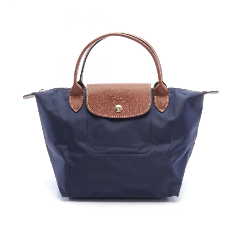 Handle bags with modern cutouts for style -Longchamp  Navy Nylon Leather Tote Bag