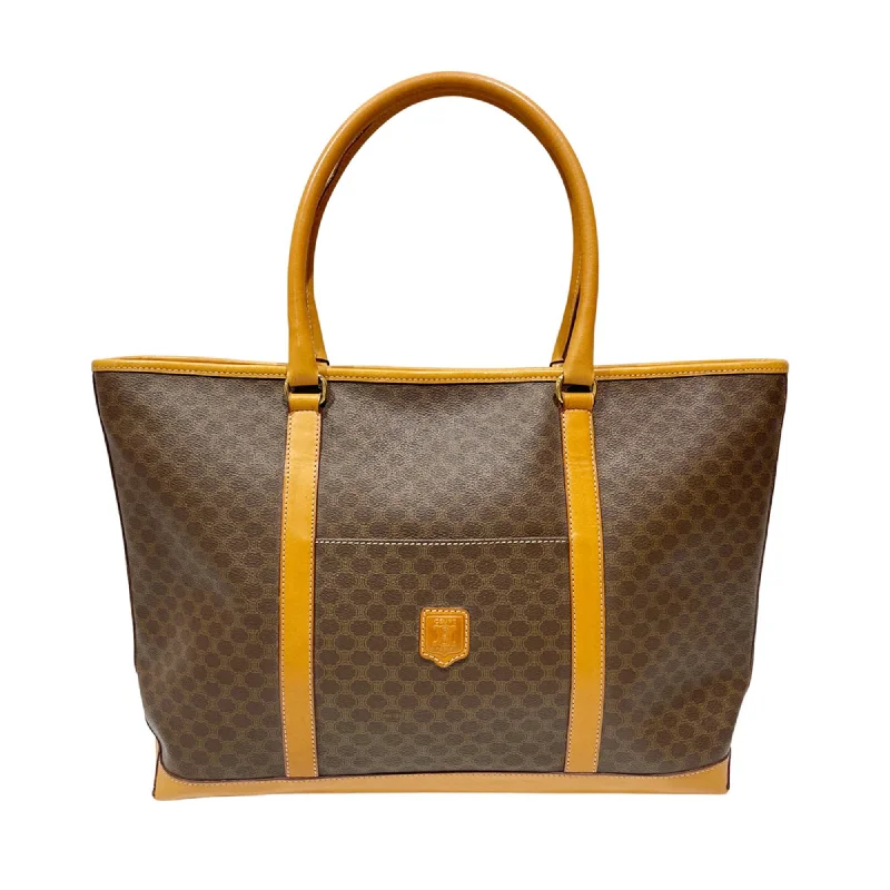 Handle bags with subtle embroidery for detail -Celine  Pvc Leather Tote Bag (Pre-Owned)