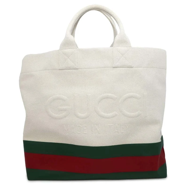 Handle bags with rustic leather for charm -Gucci   Color  Canvas Pvc Tote Bag (Pre-Owned)