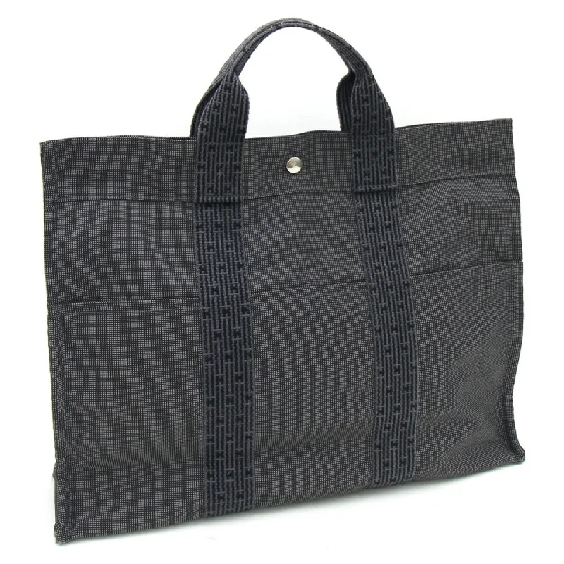 Handle bags with sturdy canvas for longevity -Hermes  Canvas Handbag Tote Bag (Pre-Owned)