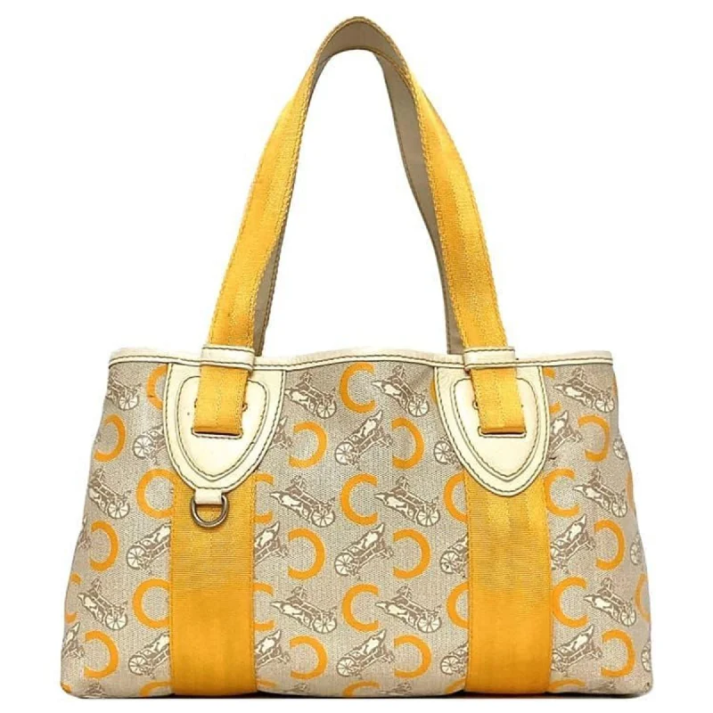 Handle bags with spacious interiors for storage -Celine  yellow Pvc Leather Tote Bag (Pre-Owned)