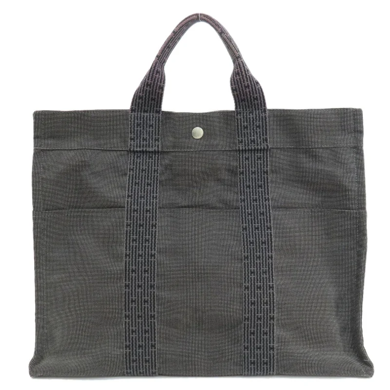 Small handle bags perfect for quick trips -Hermes Her Line  Canvas Tote Bag (Pre-Owned)