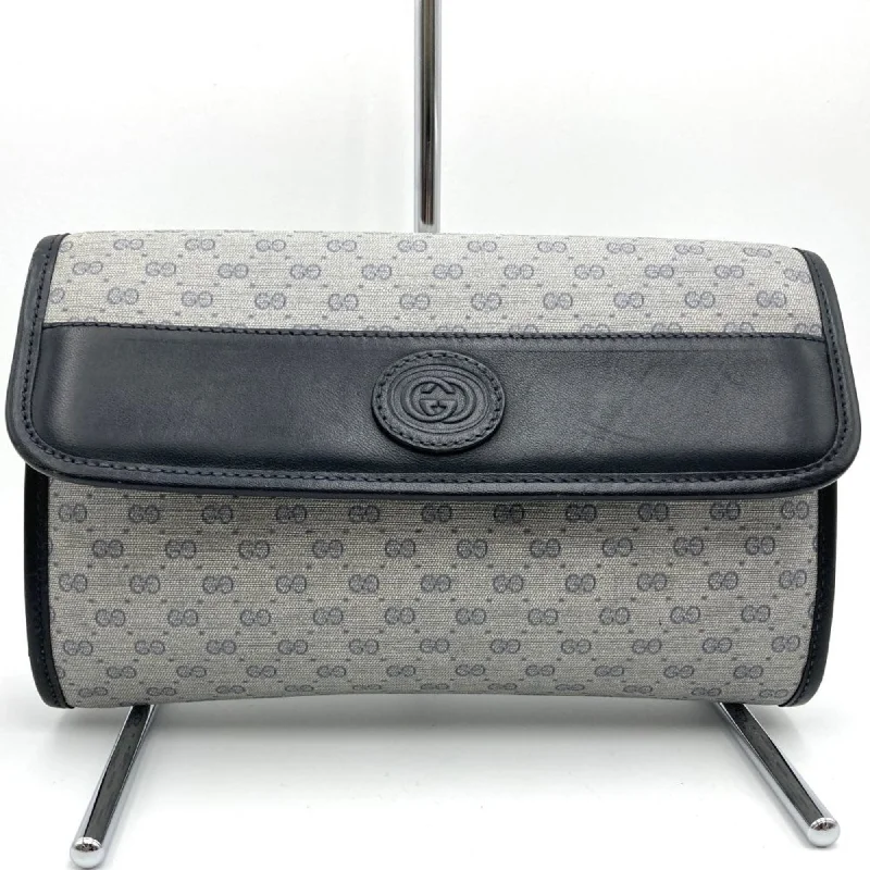 Handle bags with lightweight fabric for ease -Gucci  Gg Supreme Leather Clutch Bag (Pre-Owned)