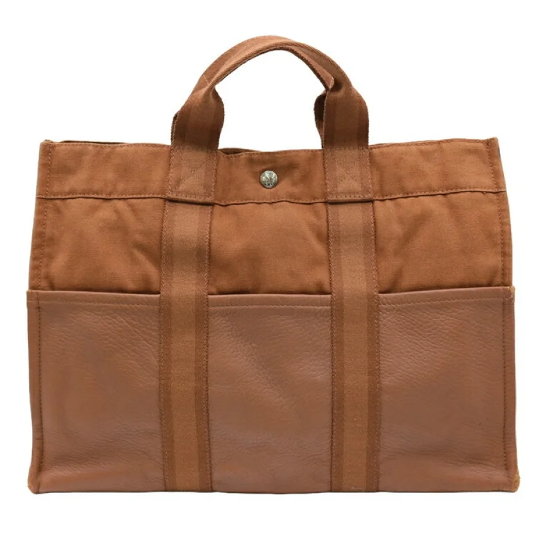 Small handle bags perfect for quick trips -Hermes  Canvas Leather Handbag Tote Bag (Pre-Owned)