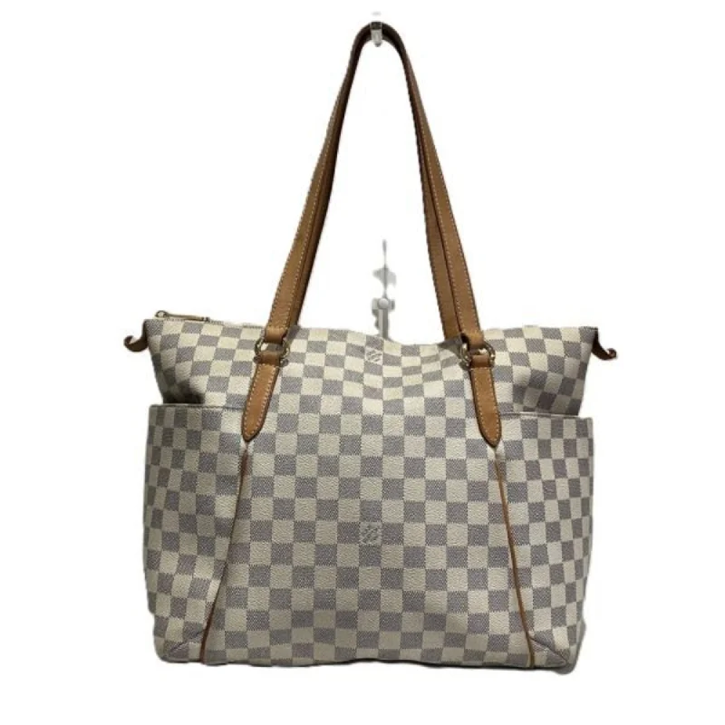 Handle bags with padded interiors for laptops -Louis Vuitton   Tote Bag (Pre-Owned)