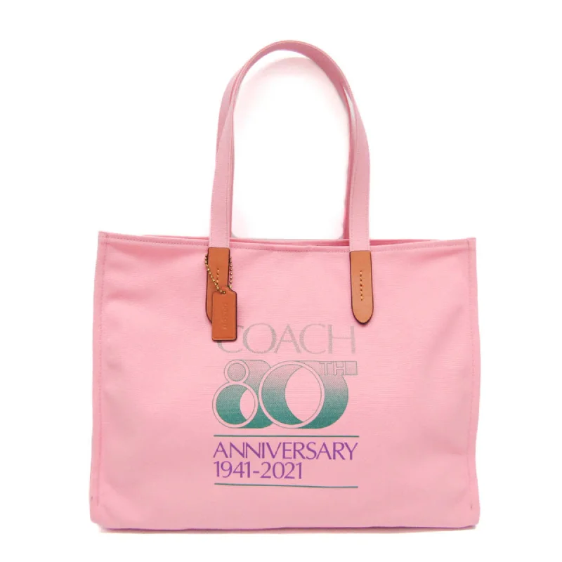 Handle bags with perforated details for style -Coach  pink Leather Canvas Tote Bag (Pre-Owned)