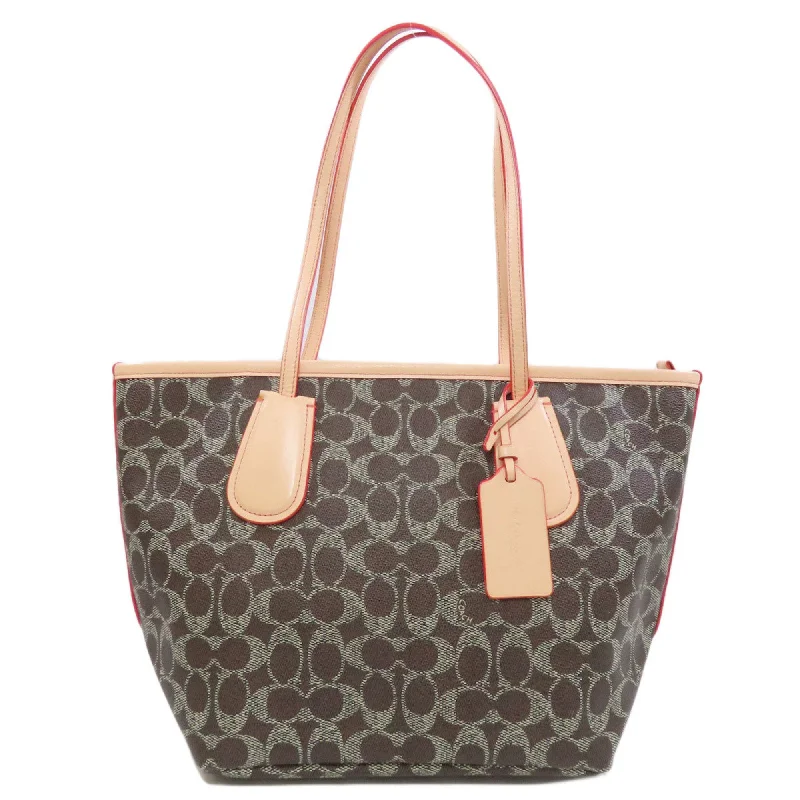 Handle bags with lightweight fabric for ease -Coach Signature  Pvc Tote Bag (Pre-Owned)