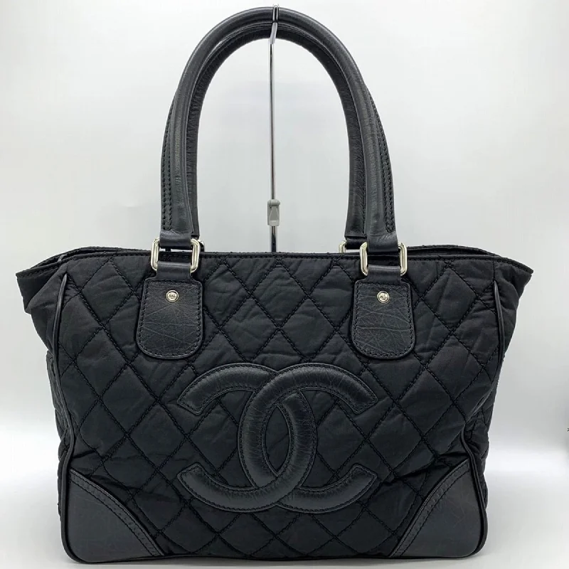 Handle bags with artistic prints for creativity -Chanel  Nylon Leather Handbag Tote Bag (Pre-Owned)